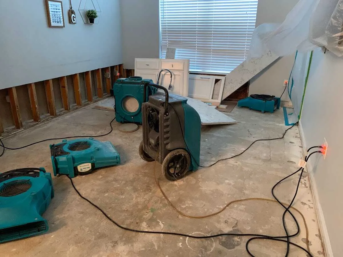 Dehumidifier in flood-cut room for Water Damage Restoration in Wesley Chapel